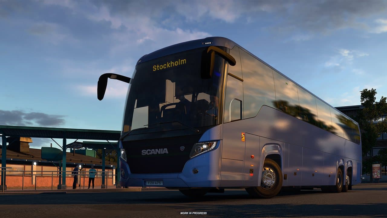 Scania Touring coach at a passenger terminal in ETS2