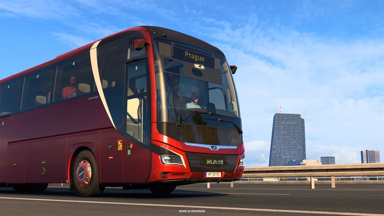 MAN Lion's Coach driving through a city in ETS2