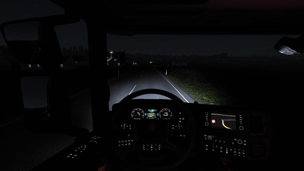 Euro Truck Simulator 2 night cabin dashboard view suited to testing custom internet radio during a long haul