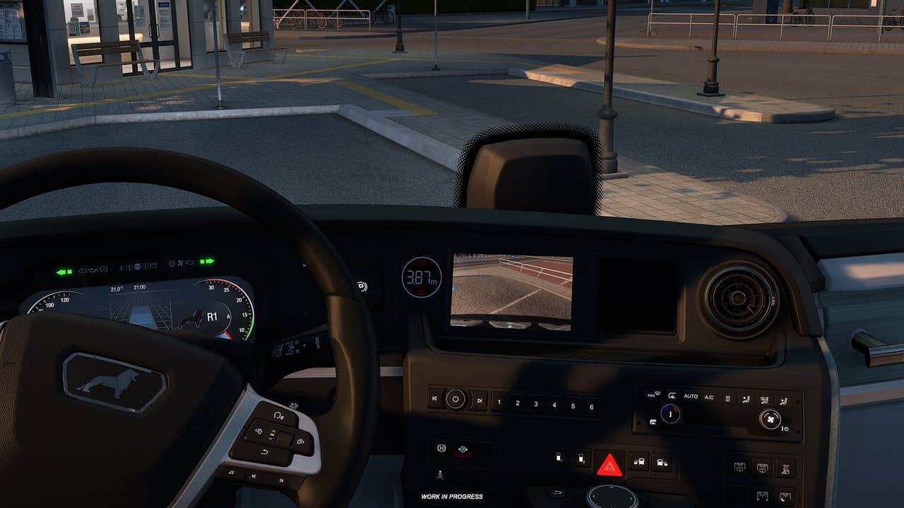 MAN Lion's Coach dashboard showing a close-range camera while reversing