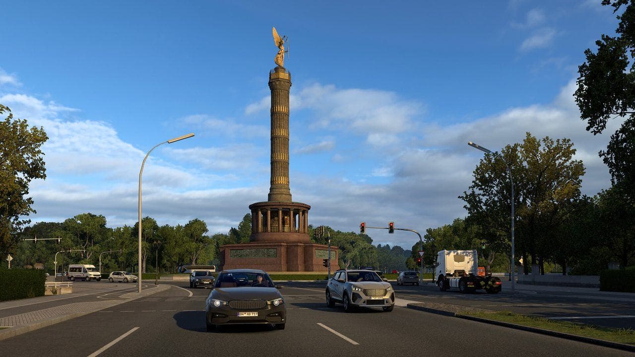 Euro Truck Simulator 2 city road near a landmark with traffic and clear daylight