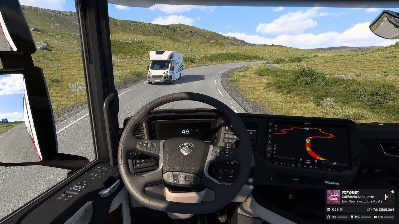 ETS2 truck cockpit while Game Radio plays from the in-game radio controls